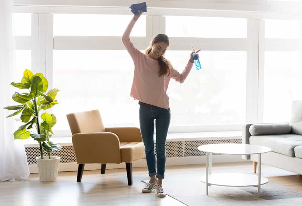 Woman spring cleaning her finances