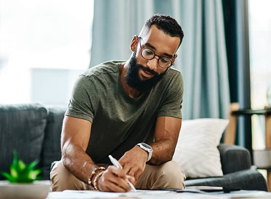 Man reviewing financial wellness