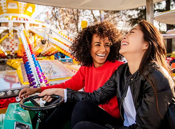 Women enjoying TicketsatWorkⓇ from BluPeak Credit Union