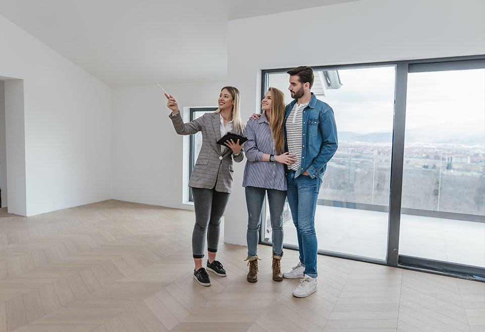 Couple looking at a place to rent or buy